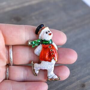 Vintage Enamel Snowman Brooch Skating Holiday Pin Red Green Glitter Hat
